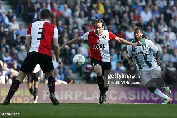 Genero Zeefuik of FC Groningen , Joris Mathijsen of Feyenoord during the Dutch Eredivisie match between FC Groningen and Feyenoord Rotterdam at...