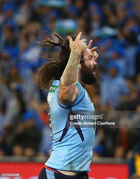 Aaron Woods of the Blues celebrates after scoring a try during game two of the State of Origin series between the New South Wales Blues and the...