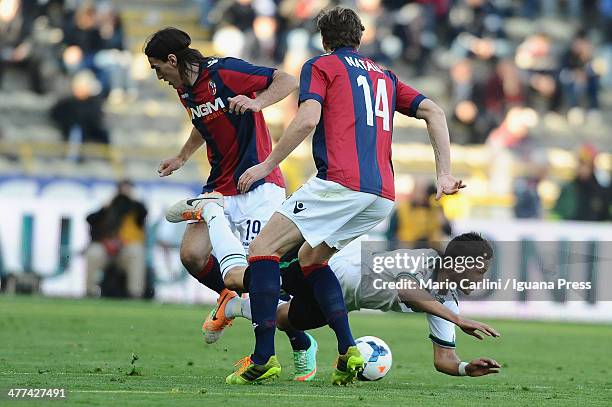 Pedro Mendes of US Sassuolo Calcio competes the ball with Lazaros of Bologna FC and Cesare Natali of Bologna FC during the Serie A match between...