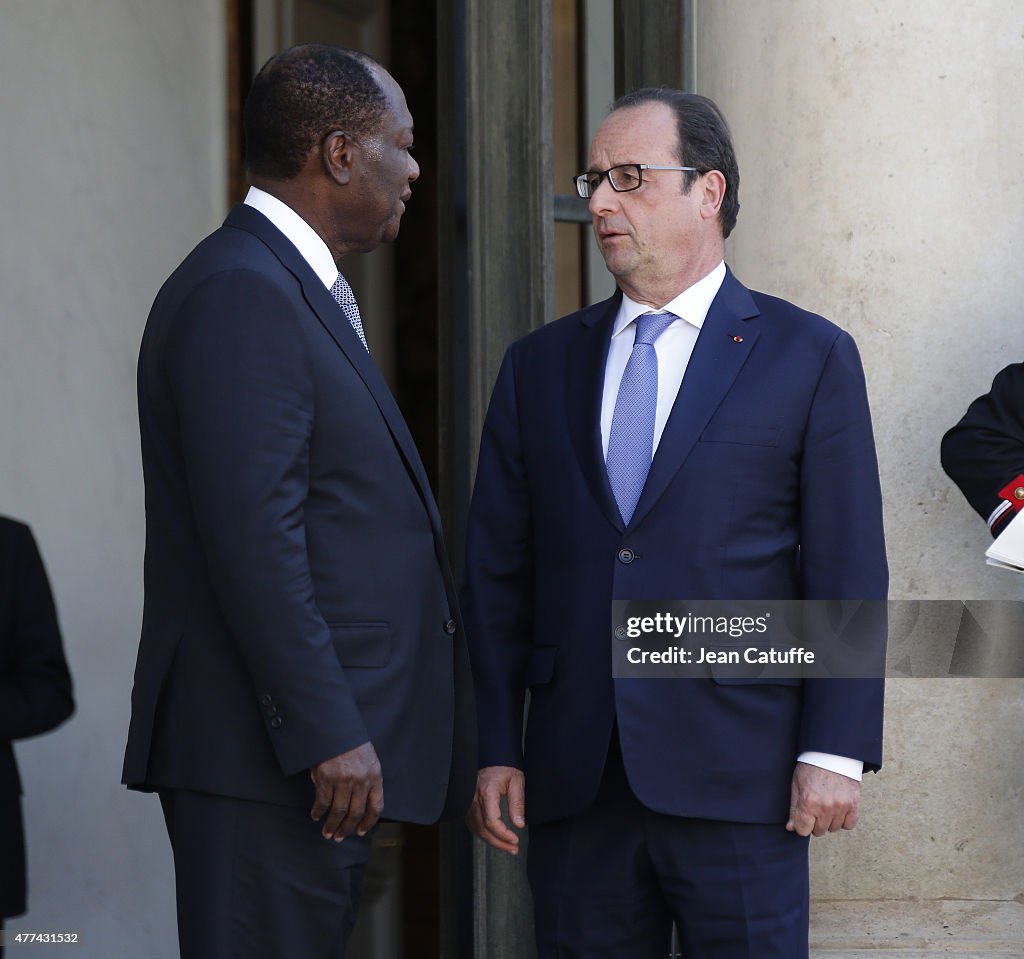 French President Francois Hollande Receives Ivory Coast President Alassane Ouattara At Elysee Palace