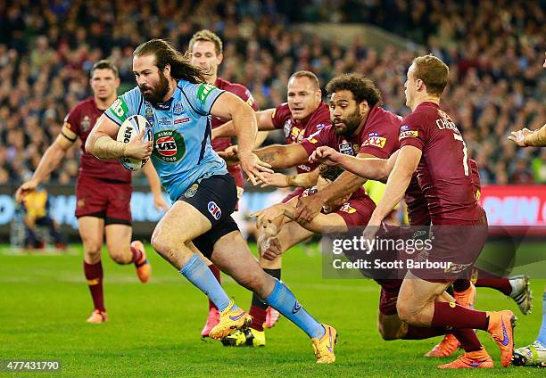 Aaron Woods of the Blues scores a try during game two of the State of Origin series between the New South Wales Blues and the Queensland Maroons at...