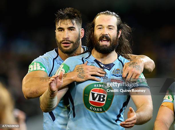 James Tamou and Aaron Woods of the Blues celebrate winning game two of the State of Origin series between the New South Wales Blues and the...