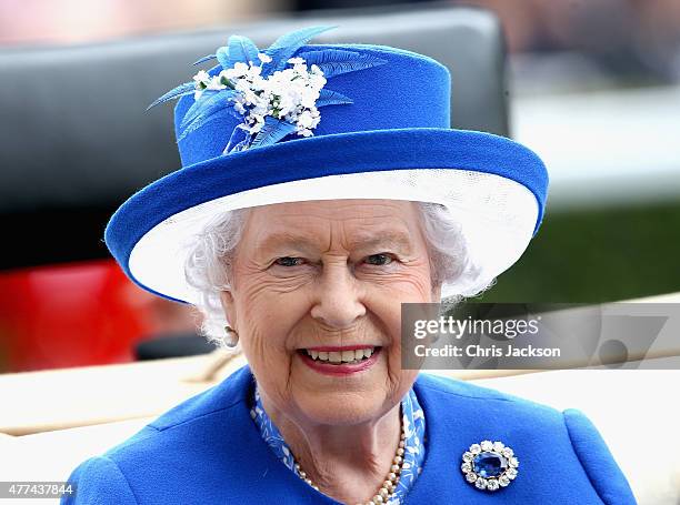 Queen Elizabeth arrives in the royal carriage for day 2 of Royal Ascot at Ascot Racecourse on June 16, 2015 in Ascot, England.