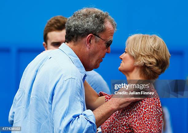 Broadcaster Jeremy Clarkson greets Alice Beer after watching the match between Gilles Simon of France and Thanasi Kokkinakis of Australia during day...