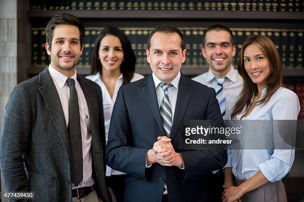 business man leading a group - lawyer office stock pictures, royalty-free photos & images