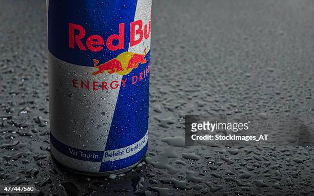 blue-silver red bull can - red bull drink stock pictures, royalty-free photos & images