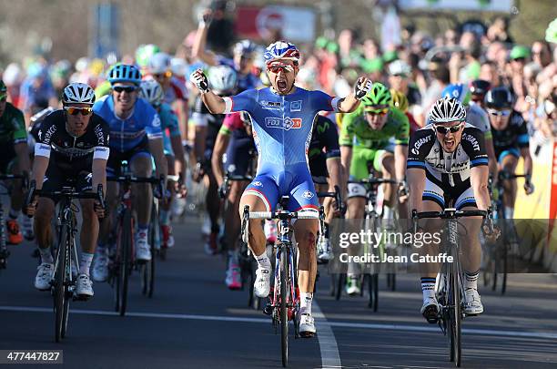 Nacer Bouhanni of France and Team FDJ wins the sprint finish, in front of John Degenkolb of Germany and Team Giant-Shimano and Gianni Meersman of...