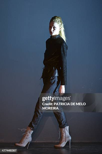 Model presents a Autumn/Winter 2014-2015 collection creation by Serbian fashion Designer Aleksandar Protic during the 42nd edition of Moda Lisboa...