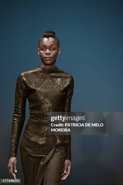 Model presents a Autumn/Winter 2014-2015 collection creation by Serbian fashion Designer Aleksandar Protic during the 42nd edition of Moda Lisboa...