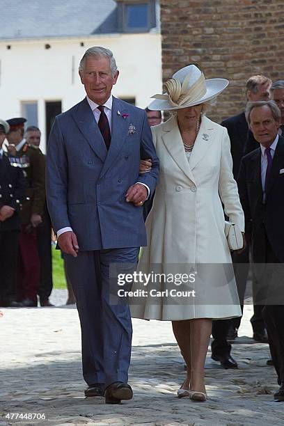 Britain's Prince Charles, Prince Of Wales and his wife Camilla, Duchess of Cornwall, leave through the North Gate of Hougoumont Farm after the...