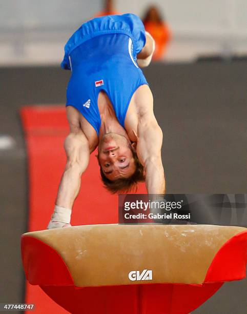 Tomas Gonzalez of Chile competes in vault during team's competition during day three of the X South American Games Santiago 2014 at Centro de Alto...