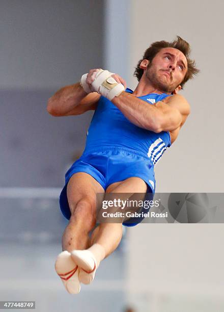 Tomas Gonzalez of Chile competes in vault during team's competition during day three of the X South American Games Santiago 2014 at Centro de Alto...