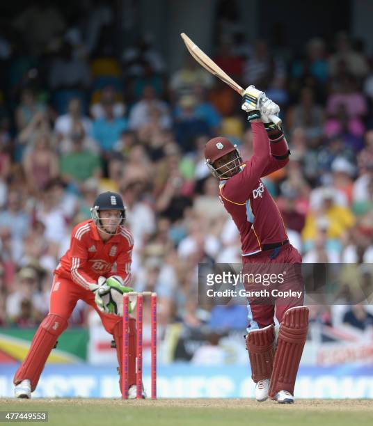 Marlon Samuels of the West Indies bats during the 1st T20 International between the West Indies and England at Kensington Oval on March 9, 2014 in...