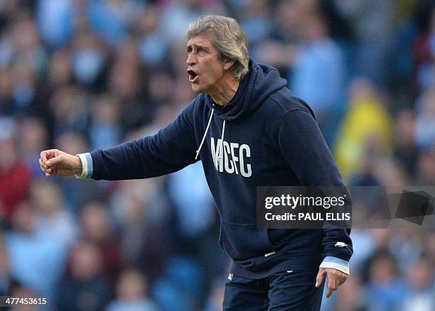 Manchester City's Chilean manager Manuel Pellegrini gestures from the touchline during the English FA Cup quarter-final football match between...