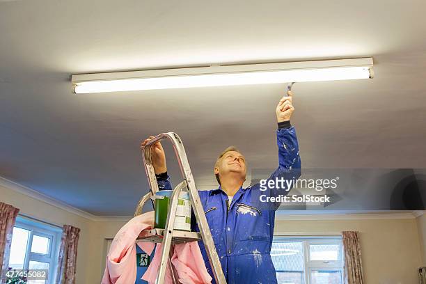 male decorator - janitor stock pictures, royalty-free photos & images