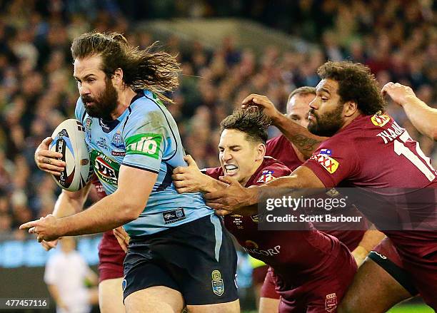 Aaron Woods of the Blues scores a try during game two of the State of Origin series between the New South Wales Blues and the Queensland Maroons at...