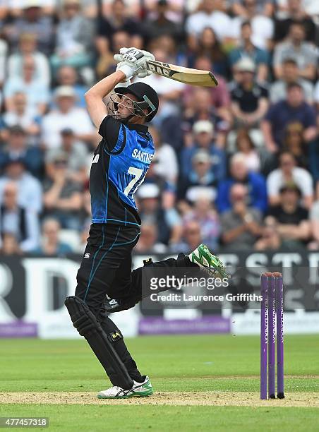 Mitchell Santner of New Zealand hits out during the 4th ODI Royal London One-Day International between England and New Zealand at Trent Bridge on...