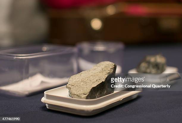 Piece of the Lorton Virginia Meteorite, which fell in Lorton, Virginia, on Monday, January 18 is seen on display from the National Museum of Natural...
