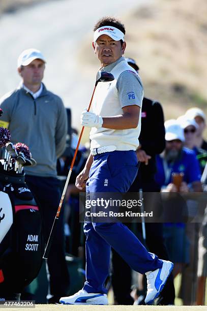 Hiroyuki Fujita of Japan waits on a tee box during a practice round prior to the start of the 115th U.S. Open Championship at Chambers Bay on June...