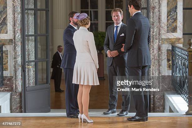 Prince Guillaume and his wife chat with Prince Pieter-Christiaan van Oranje Nassau and Prince Napoleon on June 17, 2015 in Brussel, Belgium.
