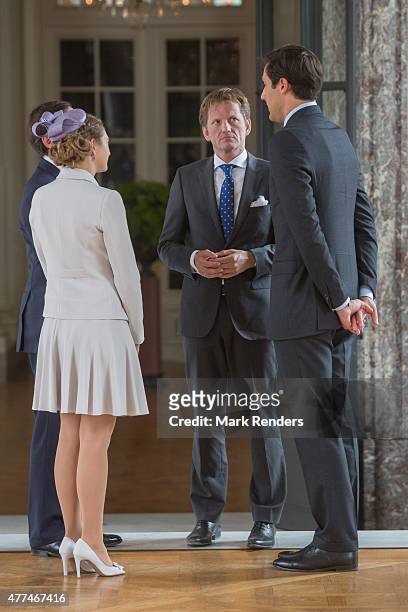 Prince Guillaume and his wife chat with Prince Pieter-Christiaan van Oranje Nassau and Prince Napoleon on June 17, 2015 in Brussel, Belgium.