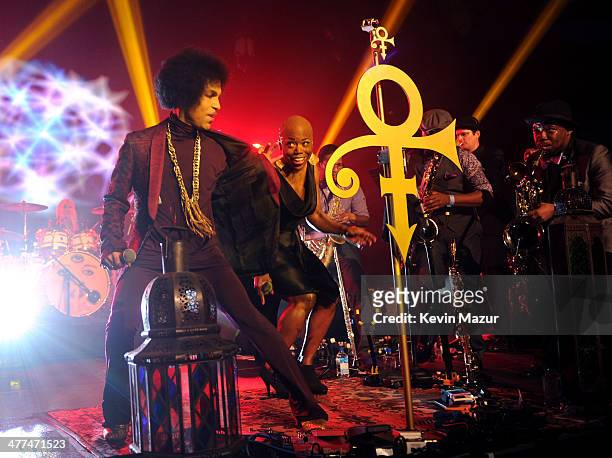 Prince and Shelby J perform onstage at The Hollywood Palladium on March 8, 2014 in Los Angeles, California.
