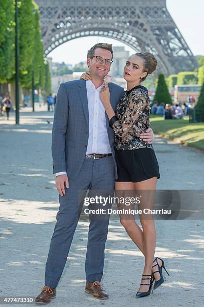 Writer John Green and model Cara Delevingne attend the Paper Towns " La Face Cachee De Margo " Photocall In Paris on June 17, 2015 in Paris, France.