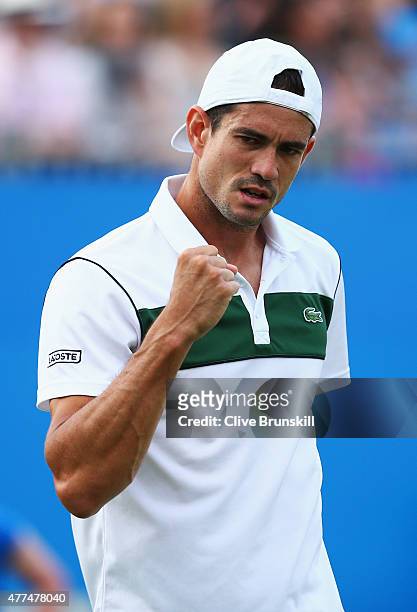 Guillermo Garcia-Lopez of Spain celebrates victory in his men's singles second round match against Alexandr Dolgopolov of Ukraine during day three of...