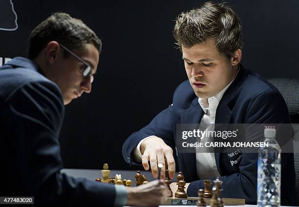 World number one in Chess Magnus Carlsen plays against the world number two Fabiano Caruana in Stavanger, Norway on June 17, 2015. Carlsen lost the...