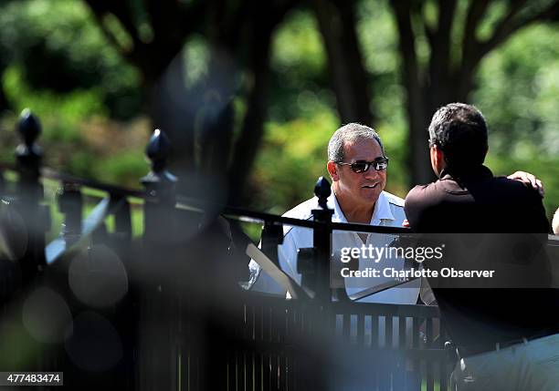 Carolina Panthers general manager Dave Gettleman stops and talks with fans prior to the team's minicamp in Charlotte, N.C., on Wednesday, June 17,...