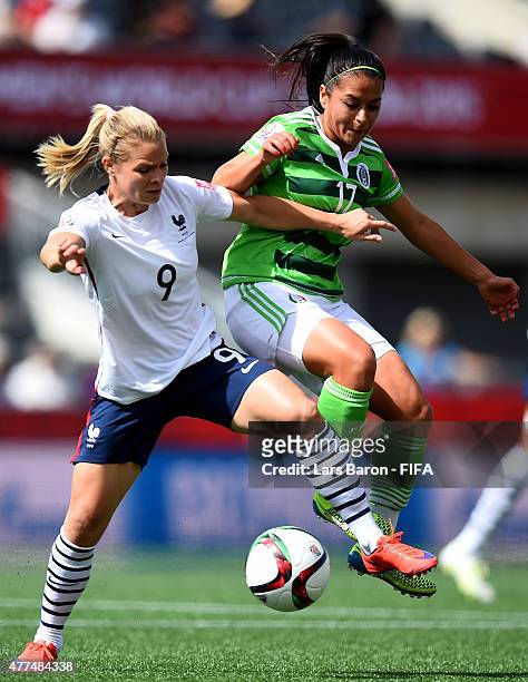 Eugenie le Sommer of France challenges Veronica Perez of Mexico during the FIFA Women's World Cup 2015 Group F match between Mexico and France at...