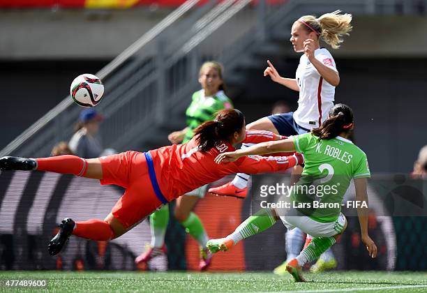 Eugenie le Sommer of France scores her teams third goal during the FIFA Women's World Cup 2015 Group F match between Mexico and France at Lansdowne...