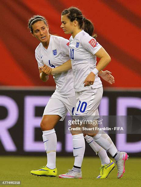 Fara Williams of England celebrates scoring her penalty goal with Karen Carney during the FIFA Womens's World Cup Group F match between England and...