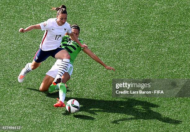 Gaetane Thiney of France is challenged by Greta Espinoza of Mexico during the FIFA Women's World Cup 2015 Group F match between Mexico and France at...