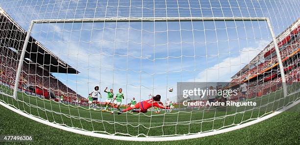 France scores their third goal against Cecilia Santiago of Mexico during the FIFA Women's World Cup Canada 2015 Group F match between Mexico and...