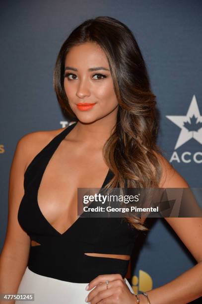 Actress Shay Mitchell arrives at the Canadian Screen Awards at Sony Centre for the Performing Arts on March 9, 2014 in Toronto, Canada.