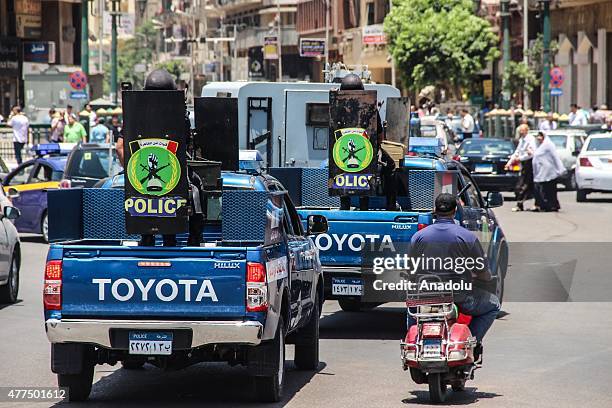 Egyptian police take security measures after Egyptian authorities reopened a vital metro station named "Sadaat" in Cairos Tahrir Square after...