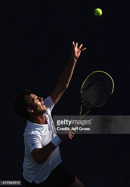 Richard Gasquet of France tosses the ball up before serving to Teymuraz Gabashvili of Russia during the BNP Paribas Open at Indian Wells Tennis...
