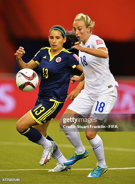 Toni Duggan of England is challenged by Angela Clavijo of Colombia during the FIFA Womens's World Cup Group F match between England and Colombia at...