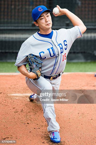 Starting pitcher Tsuyoshi Wada of the Chicago Cubs warms up in the bullpen prior to the game against the Cleveland Indians at Progressive Field on...