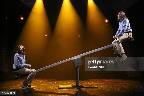 Episode 0282 -- Pictured: Musician James Taylor and host Jimmy Fallon during the "Two James Taylors on a Seesaw" skit on June 17, 2015 --