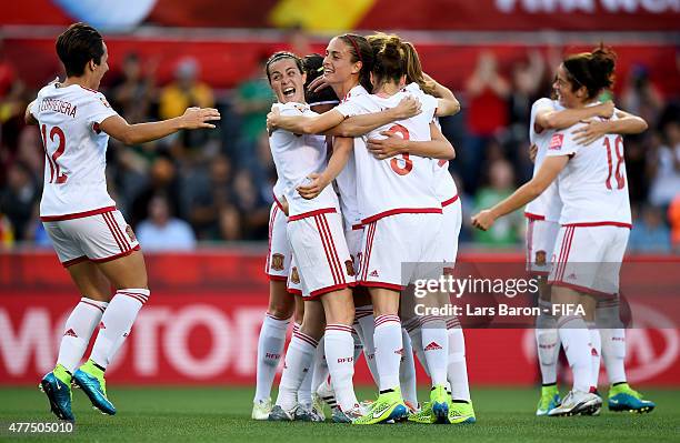 Veronica Boquete of Spain celebrates with team mates after scoring her teams first goal during the FIFA Women's World Cup 2015 Group E match between...