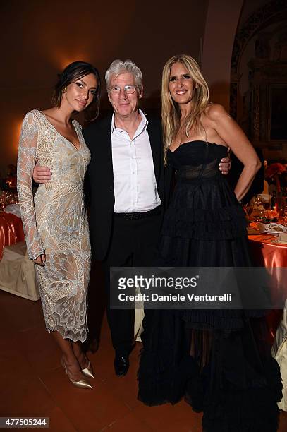 Madalina Ghenea, Richard Gere and Tiziana Rocca attend the Shiseido And Vanity Fair Gala Dinner - 61st Taormina Film Fest at Hotel San Domenico on...