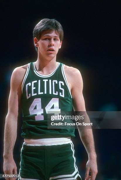 Danny Ainge of the Boston Celtics looks on while there's a break in the action against the Washington Bullets during an NBA basketball game circa...