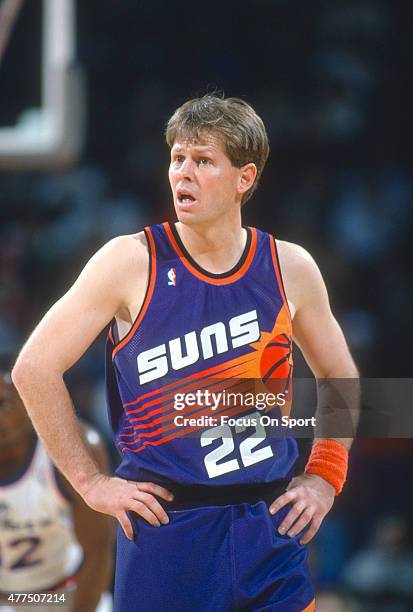 Danny Ainge of the Phoenix Suns looks on against the Washington Bullets during an NBA basketball game circa 1993 at the Capital Centre in Landover,...