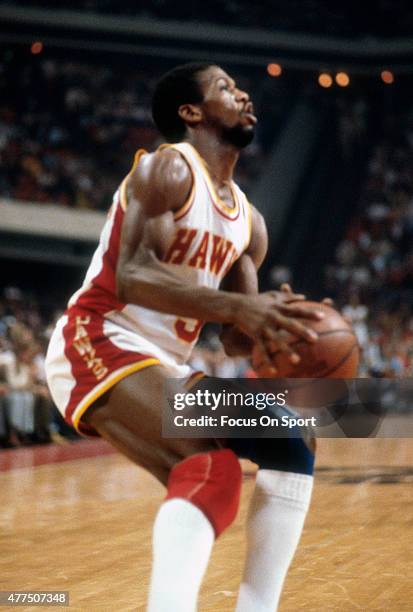 Eddie Johnson of the Atlanta Hawks looks to shoot during an NBA basketball game circa 1980 at the Omni Coliseum in Atlanta, Georgia. Johnson played...