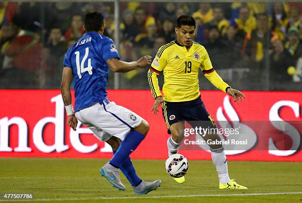 Teofilo Gutierrez of Colombia fights for the ball with Thiago Silva of Brazil during the 2015 Copa America Chile Group C match between Brazil and...