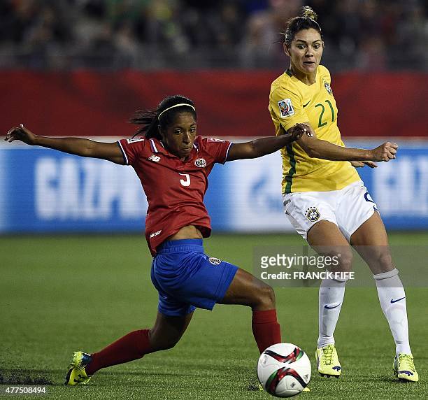 Costa Rica's forward Carolina Venegas vies with Brazil's midfielder Gabriela during a Group E match at the 2015 FIFA Women's World Cup between Costa...