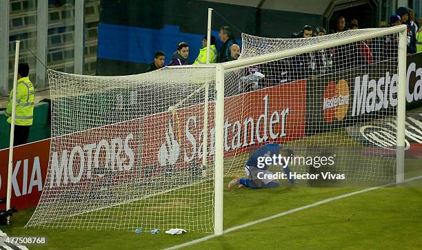 Neymar of Brazil lies injuried after missing a chance at goal during the 2015 Copa America Chile Group C match between Brazil and Colombia at...