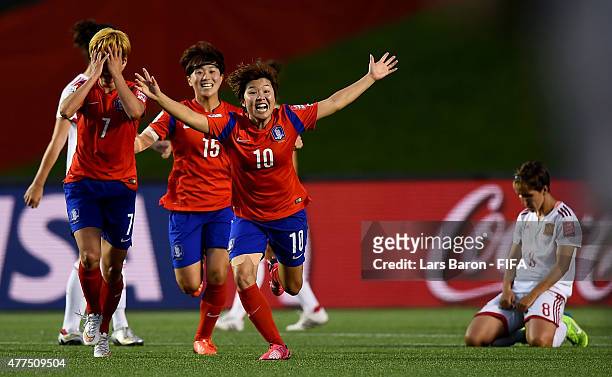Soyun Ji of Korea celebrates with team mates after winning the FIFA Women's World Cup 2015 Group E match between Korea Republic and Spain at...